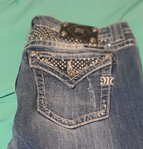 Miss Me Blue Jeans with Decorative Stitching and Subtle Fading